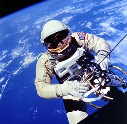 US Astronaut Edward H White II carrying out external tasks during the third orbit of Gemini-Titan 4 flight
